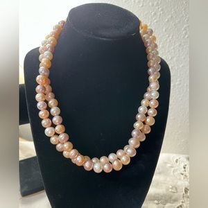 Beautiful 10 mm genuine cultured pearls in natural multicolor strand.